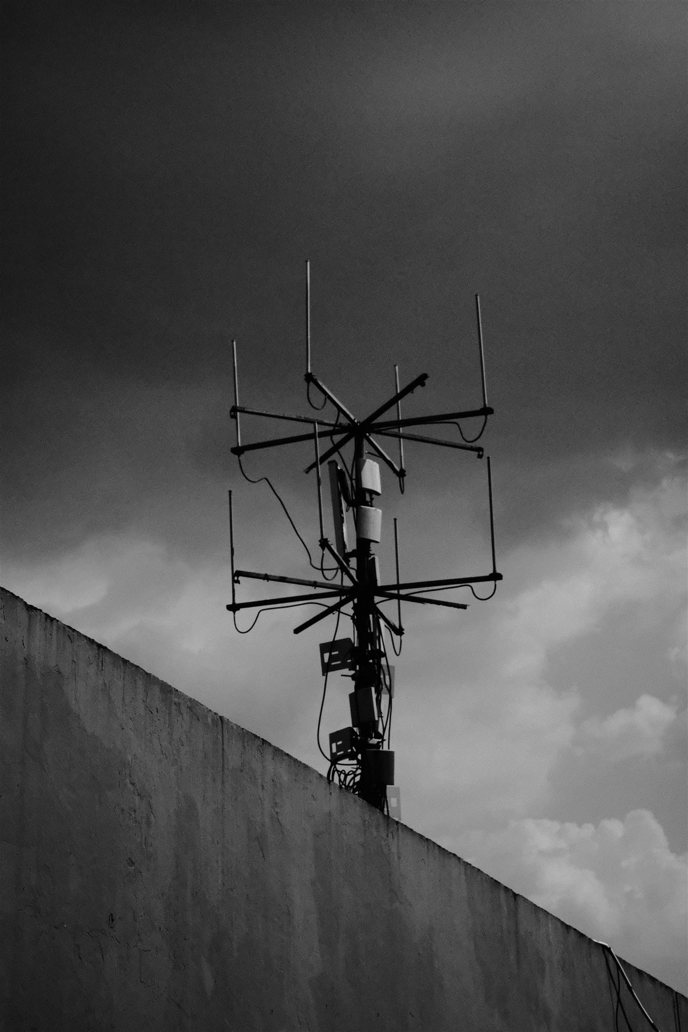 Rooftop wireless antenna equipment for long-range building communication.